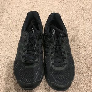 Black pair of ASICS